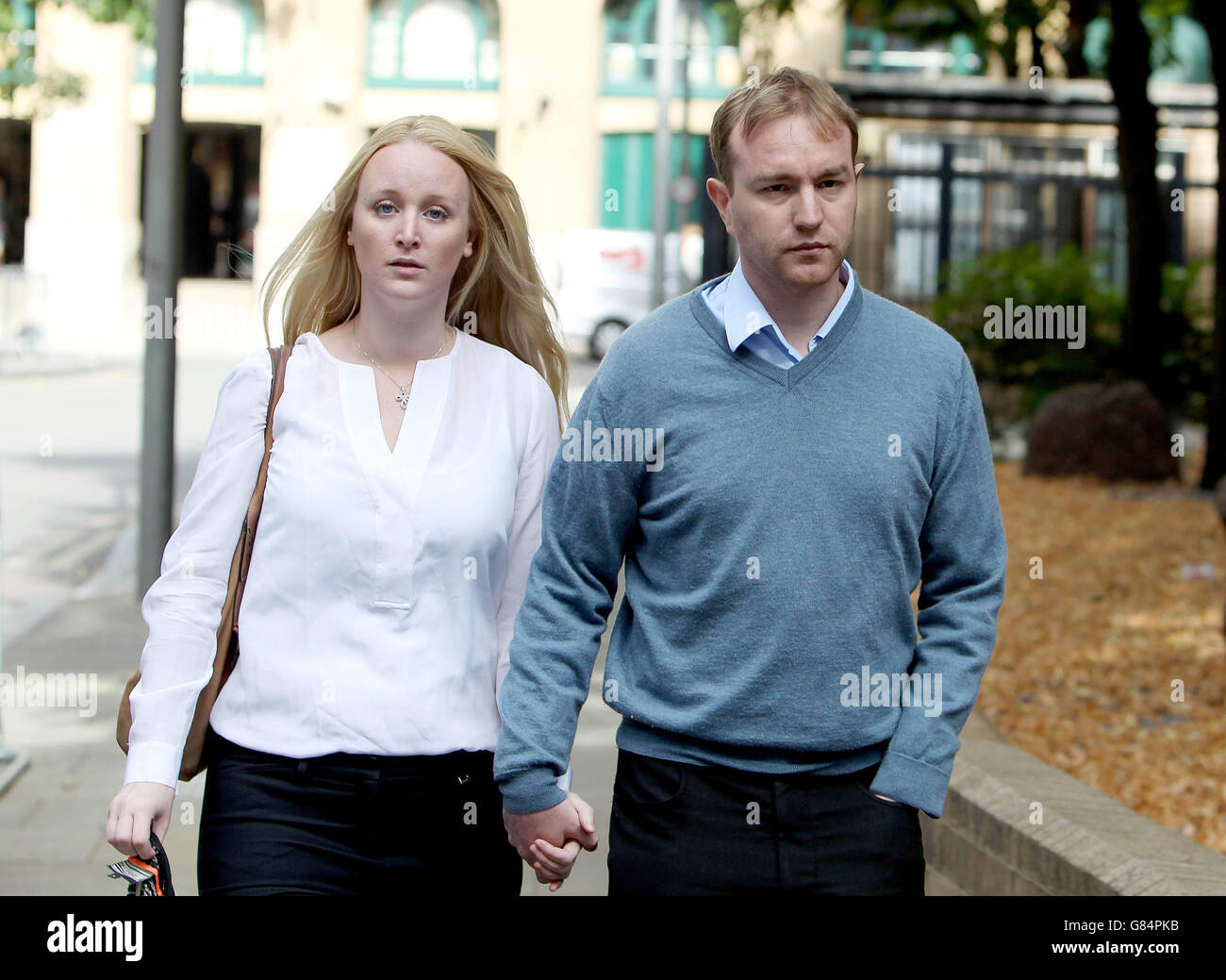 Trader Tom Hayes and his wife Sarah arriving at Southwark Crown Court, in London, where he stands accused of rigging Libor interest rates. Picture date: Wednesday July 29, 2015. Hayes, 35, is accused of masterminding a plot with others to manipulate the rate which affected trillions of dollars worth of financial deals. Photo credit should read: Steve Parsons/PA Wire Stock Photo