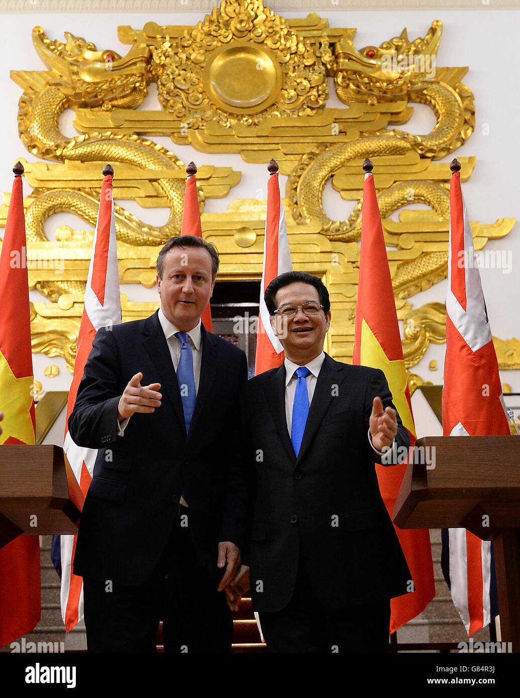 Prime Minister David Cameron holds a press conference with his Vietnamese counterpart, Nguyen Tan Dung, at his offices in Hanoi, Vietnam, as he became the first British leader to visit the country. Stock Photo