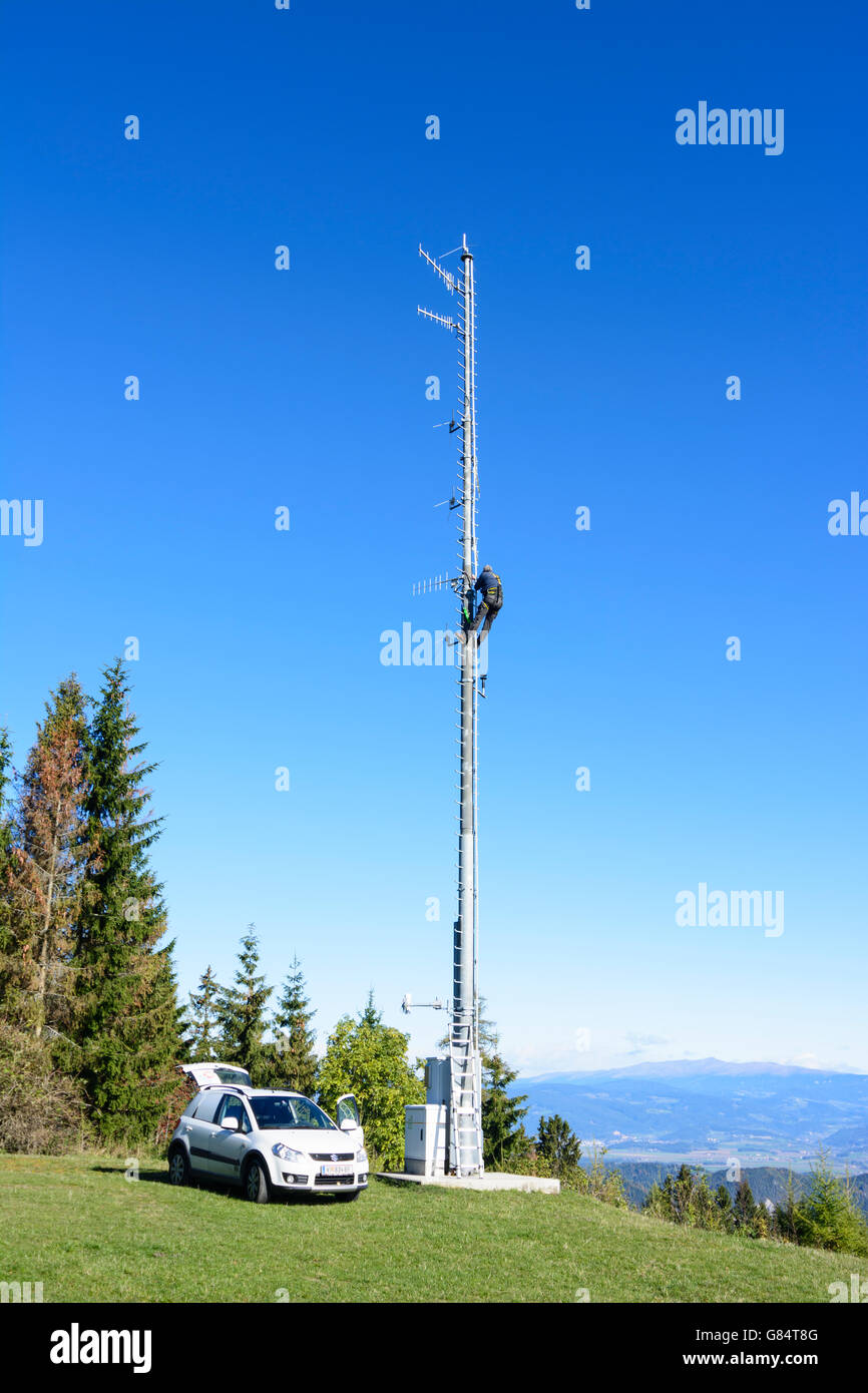 Fitter on an antenna mast on the Magdalensberg, Magdalensberg, Austria, Kärnten, Carinthia, Stock Photo