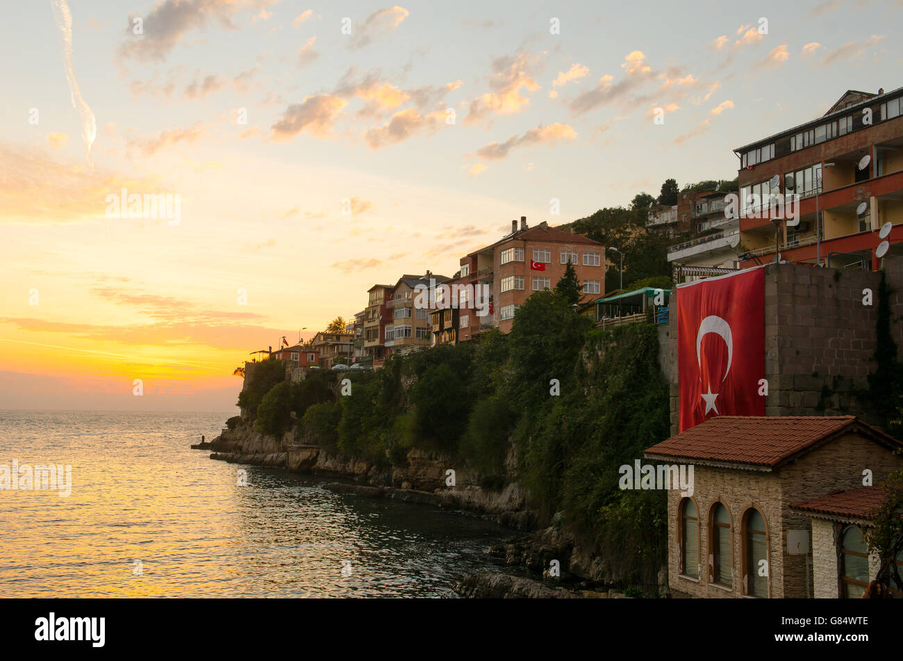 Sunset Over Turkish Village Of Amasra With Large Turkish Flag On sunset-over-turkish-village-of-amasra-with-large-turkish-flag-on