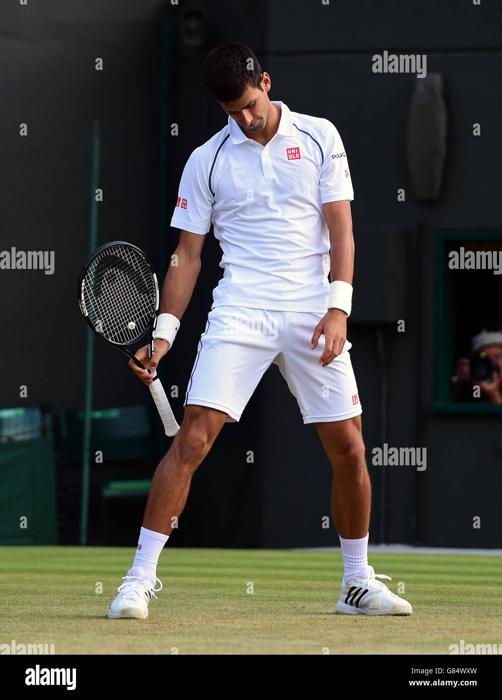 Novak Djokovic in action against Kevin Anderson during day Seven of the Wimbledon Championships at the All England Lawn Tennis and Croquet Club, Wimbledon. Stock Photo