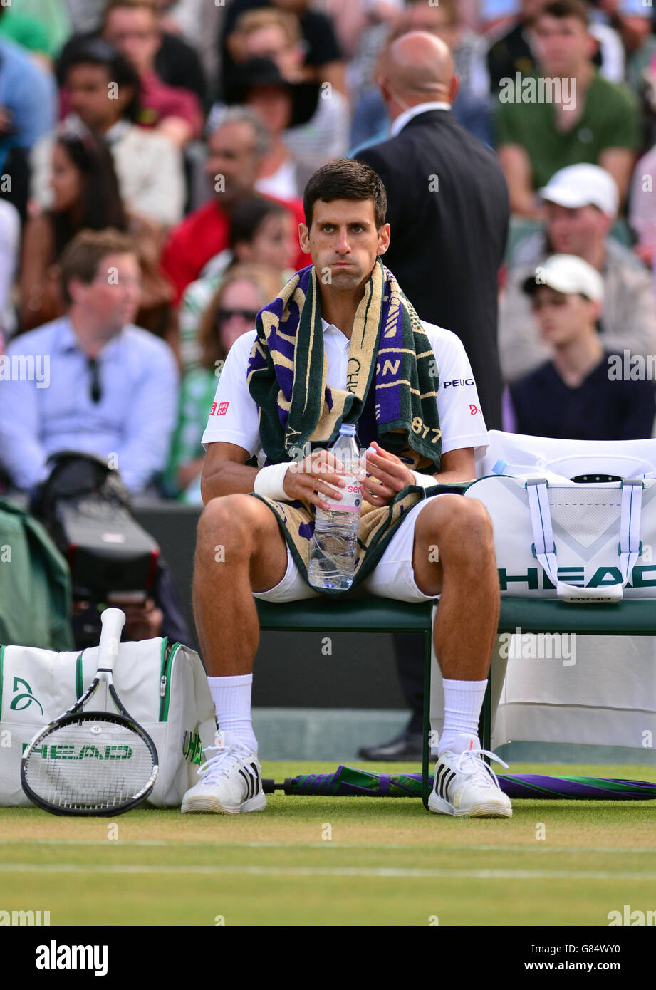 Novak Djokovic in action against Kevin Anderson during day Seven of the Wimbledon Championships at the All England Lawn Tennis and Croquet Club, Wimbledon. Stock Photo