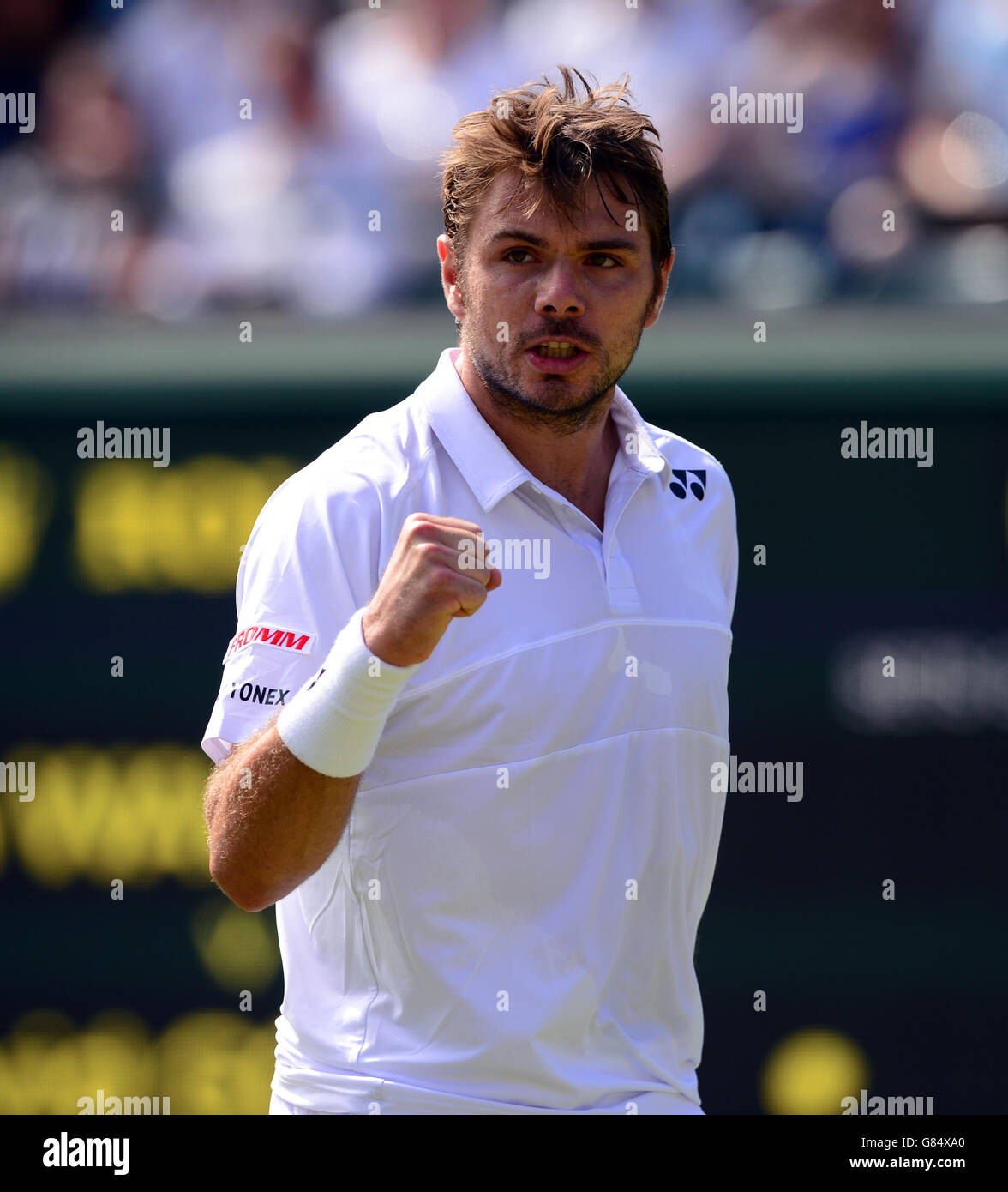 Stan Wawrinka celebrates a point against David Goffin during day Seven of the Wimbledon Championships at the All England Lawn Tennis and Croquet Club, Wimbledon. Stock Photo