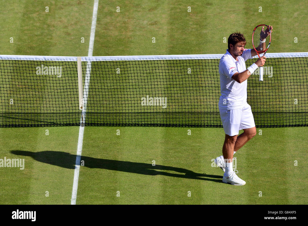 Stan Wawrinka celebrates victory over David Goffin during day Seven of the Wimbledon Championships at the All England Lawn Tennis and Croquet Club, Wimbledon. Stock Photo