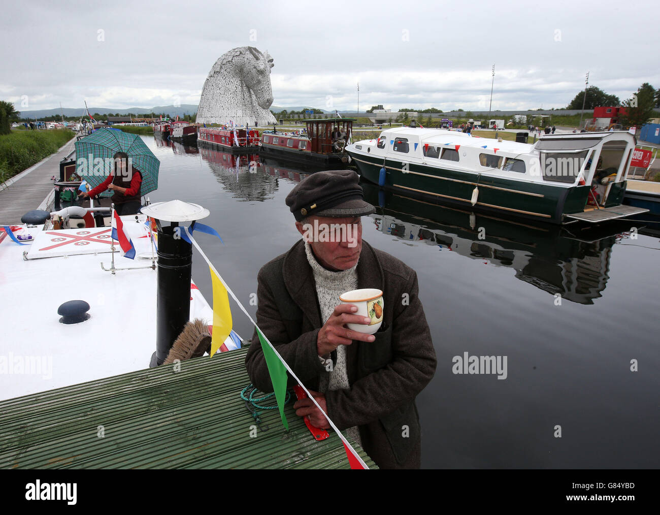 Boaters Dougie and Bernadette MacFarlane on their barge Pendle on the Forth and Clyde Canal after the visitor attraction was officially opened by the Princess Royal. Stock Photo