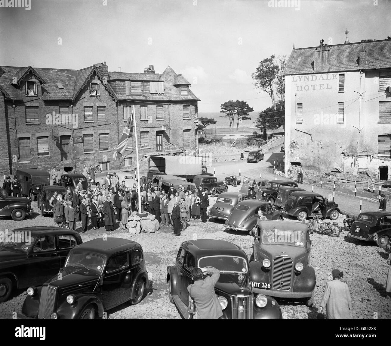 Mrs S Slater, Chairman of the Lynton and Lynmouth Urban District Council, conducts a ceremony to re-open the town of Lynmouth less than a month after flood waters rampaged through the Devon resort. Stock Photo