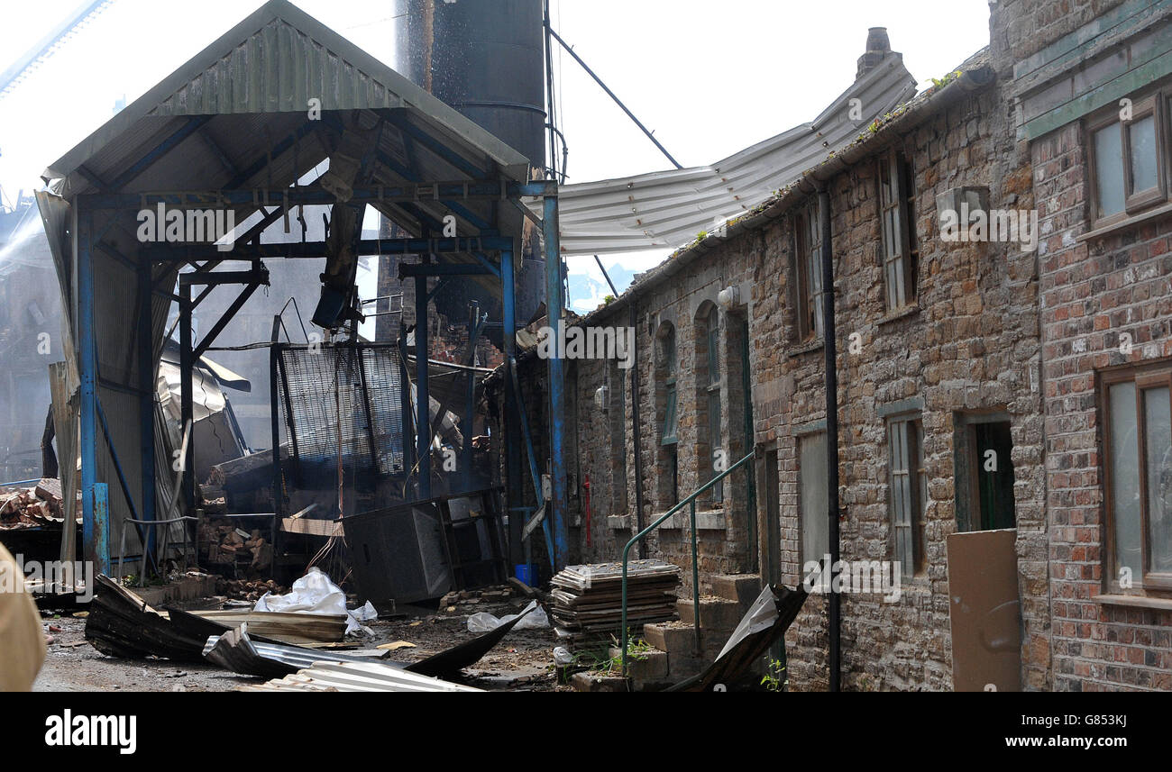The scene of an explosion and fire where four people are still missing