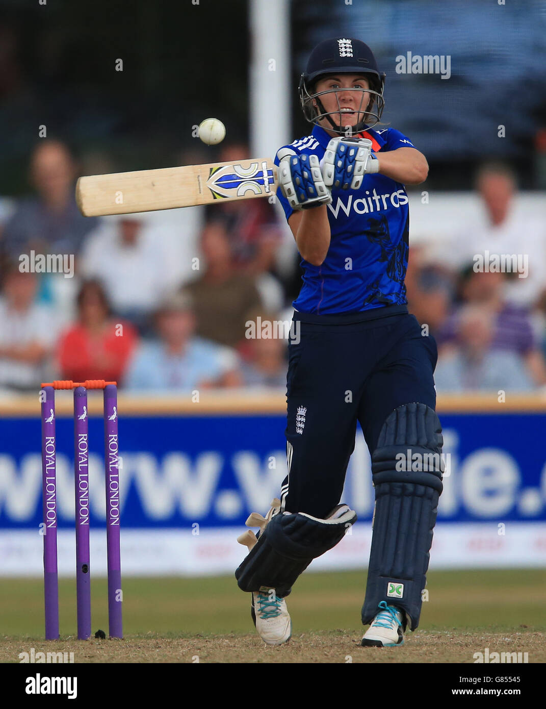 England batter Natalie Sciver hits a full toss off Australia bowler Erin Osborne, during the first One Day International of the women's Ashes at The County Ground, Taunton. Picture date: Tuesday July 21, 2015. See PA story CRICKET England Women. Photo credit should read: Nick Potts/PA Wire. RESTRICTIONS: No commercial use without prior written consent of the ECB. Still image use only no moving images to emulate broadcast. No removing or obscuring of sponsor logos. Call +44 (0)1158 447447 for further information Editorial Stock Photo