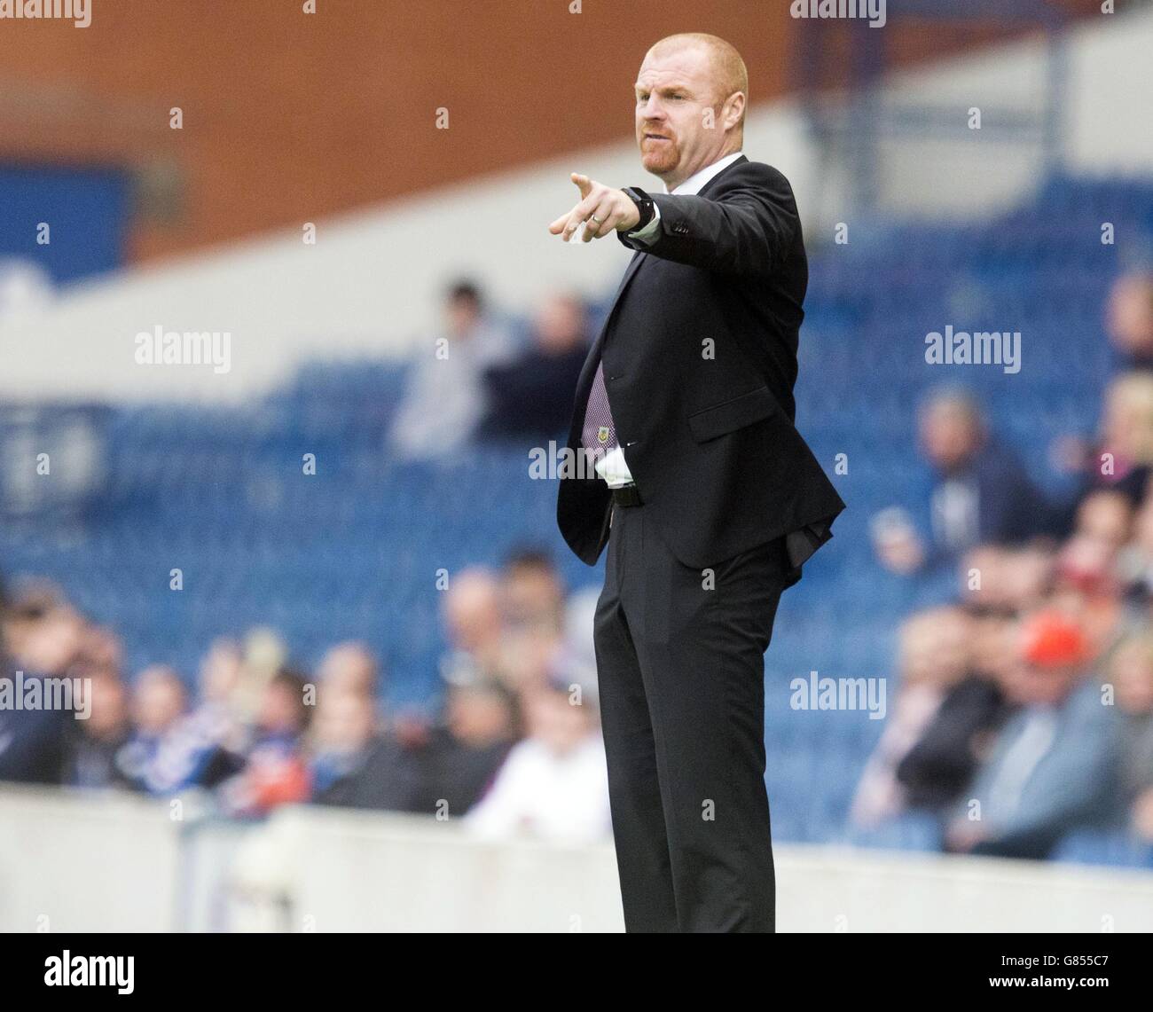 Burnley manager Sean Dyce on the touchline during the pre-season friendly match at the Ibrox Stadium, Glasgow. Stock Photo
