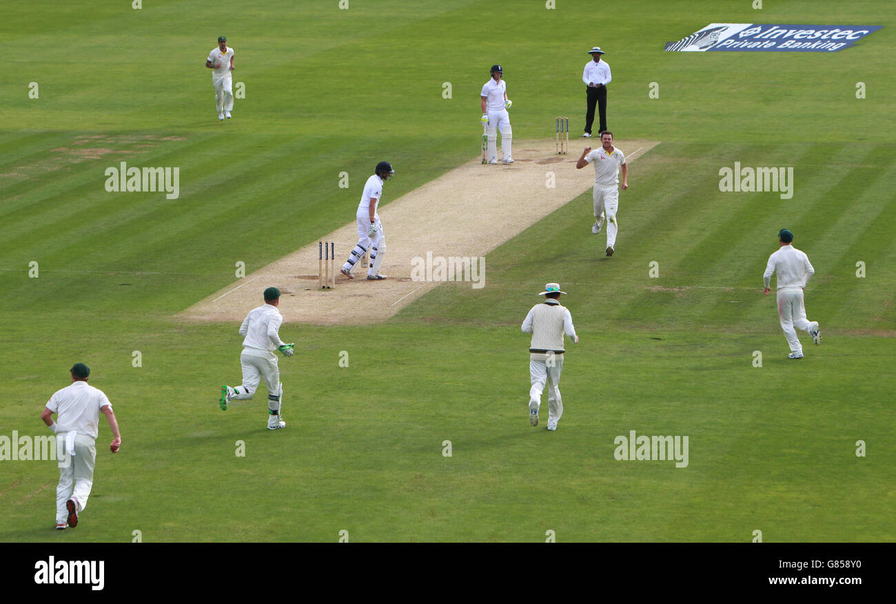 England batsman Joe Root looks back at his stumps as he bowled for 60 by Australia's Josh Hazlewood , during the First Investec Ashes Test at the SWALEC Stadium, Cardiff. Stock Photo