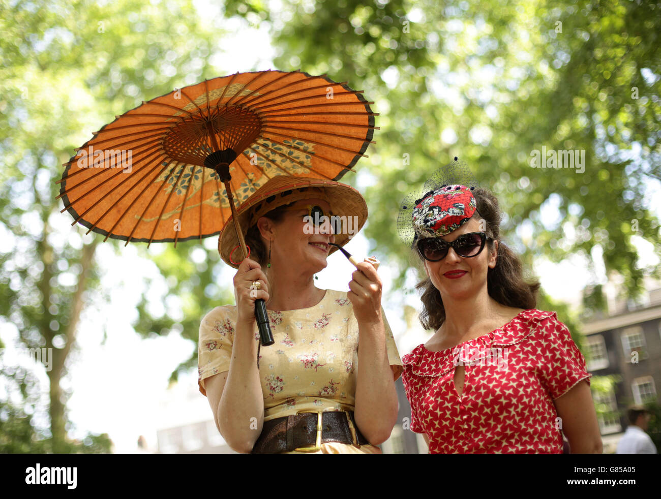 People attending the Chap Olympiad 2015 in Bedford Square, Bloomsbury, London. The eccentric event describes itself as a celebration of Britain's sporting ineptitude where sensational cravats take precedence over sweaty lycra. Stock Photo