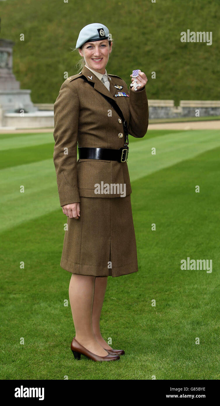 Major Laura Nicholson after receiving her Distinguished Flying Cross from Queen Elizabeth II during an Investiture ceremony at Windsor Castle. Stock Photo