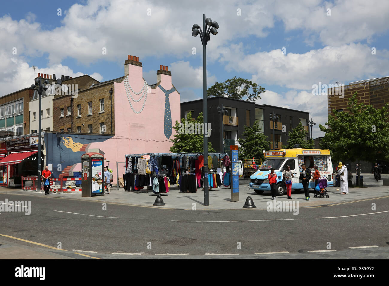 Market square on Deptford High Street in southeast London. Shows new pedestrian area with stalls, ice cream van and mural, Stock Photo