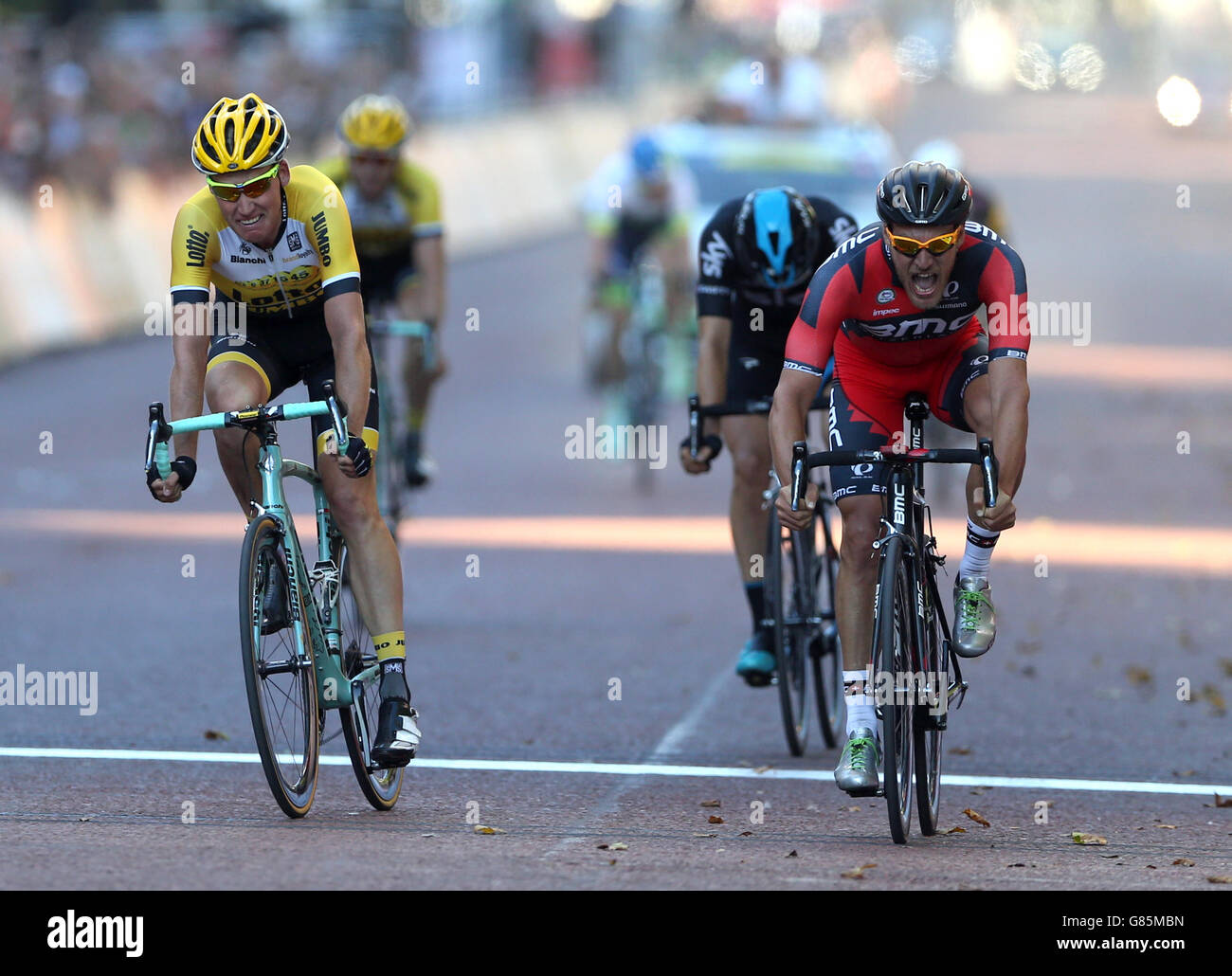 BMC Racing Team's Jean Pierre Drucker (right) celebrates after winning the London-Surrey Classic ahead of Team Lotto NL-Jumbo's Mike Teunissen during day Two of the Prudential RideLondon, London. Stock Photo