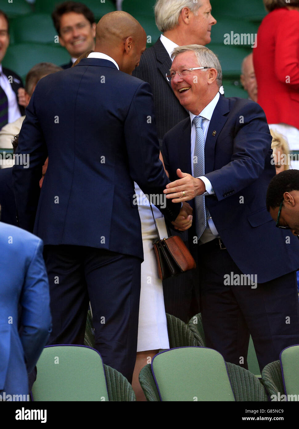 thierry-henry-left-shakes-hands-with-sir-alex-ferguson-right-in-the-G85NC9.jpg