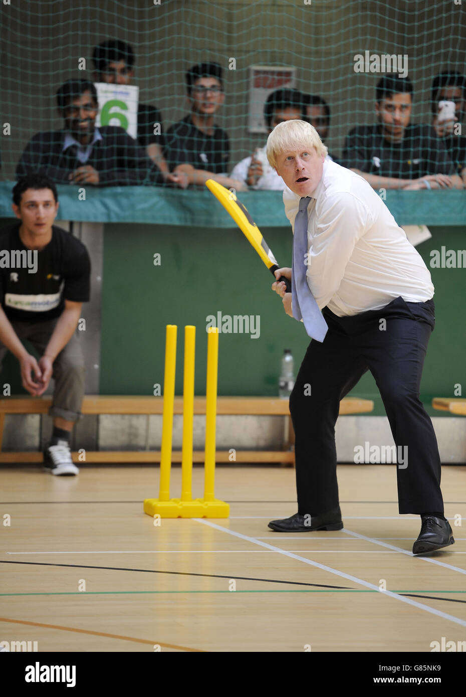 Mayor of London Boris Johnson takes part in a street cricket tournament in aid of Chance to Shine Street charity at Hillingdon Sports and Leisure Complex in London. Stock Photo
