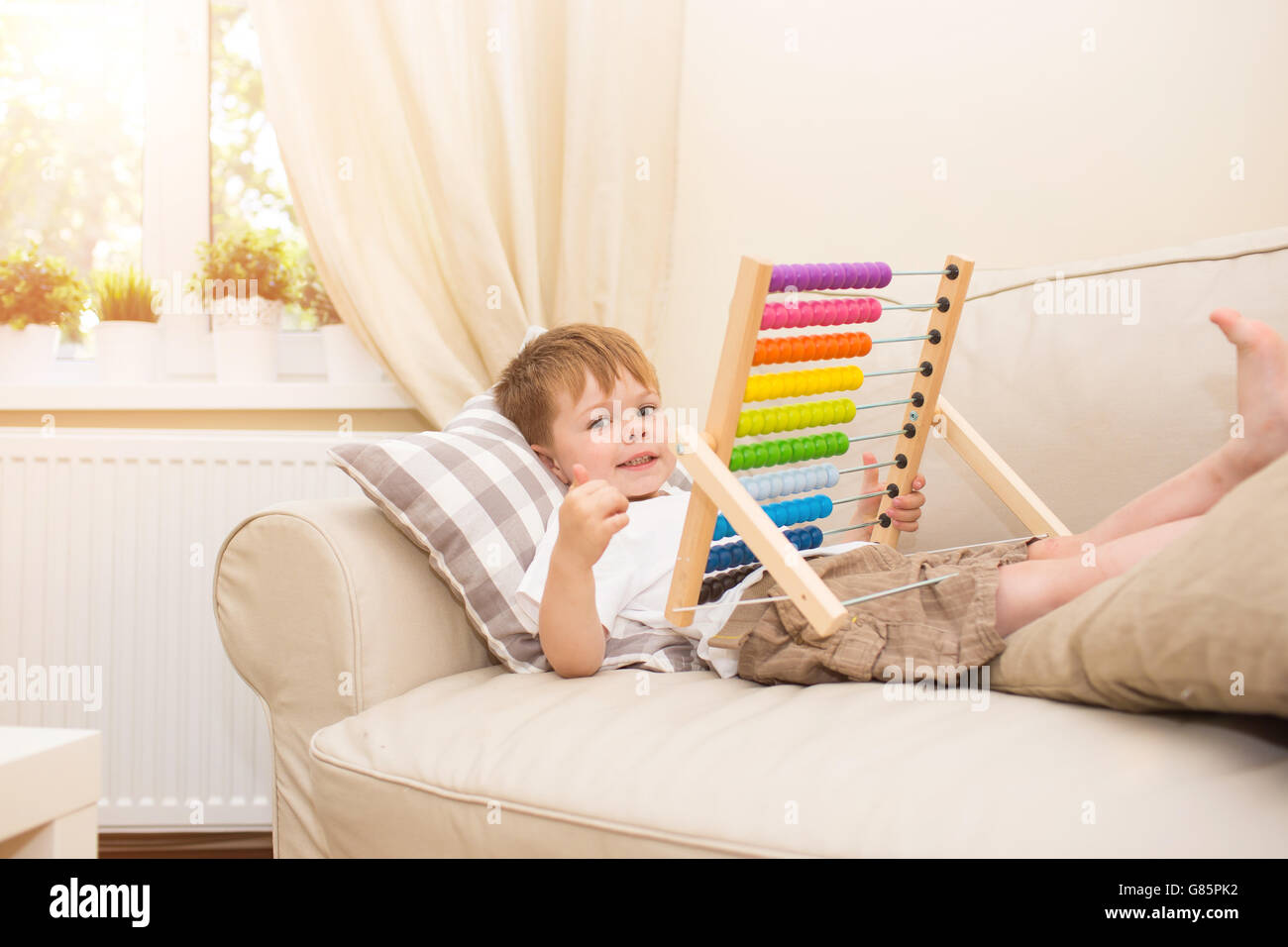 Boy toddler playing with tools hi-res stock photography and images - Alamy