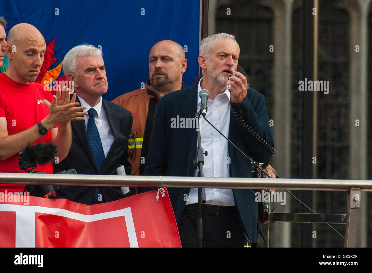 Labour leader Jeremy Corbyn speaks in Parliament Square, alongside Shadow Chancellor John McDonnell (second left), where the Momentum campaign group are holding a Keep Corbyn demonstration. Stock Photo
