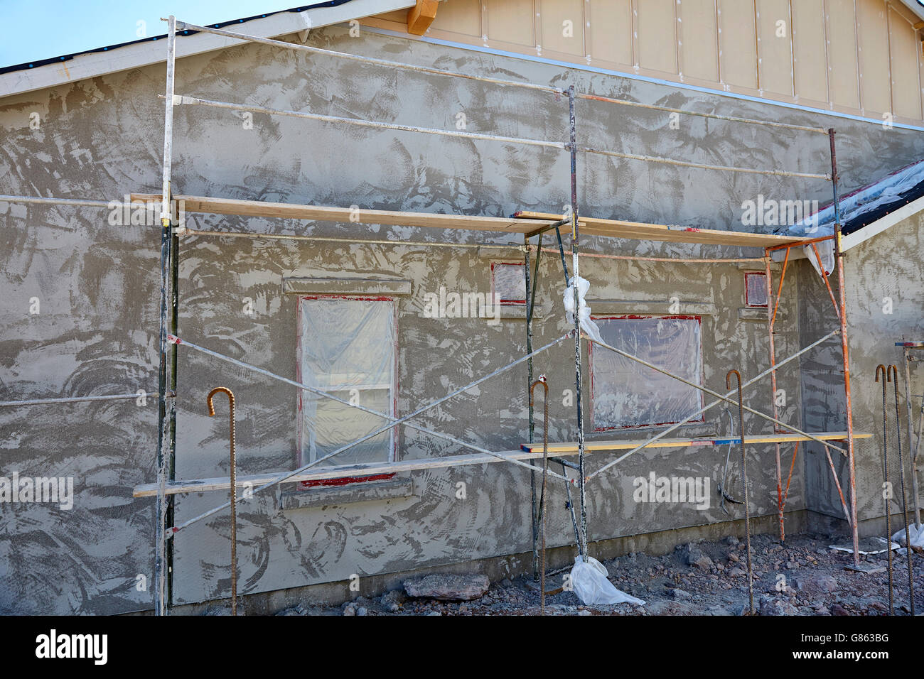 New home construction stucco plaster wall and scaffold system jobsite