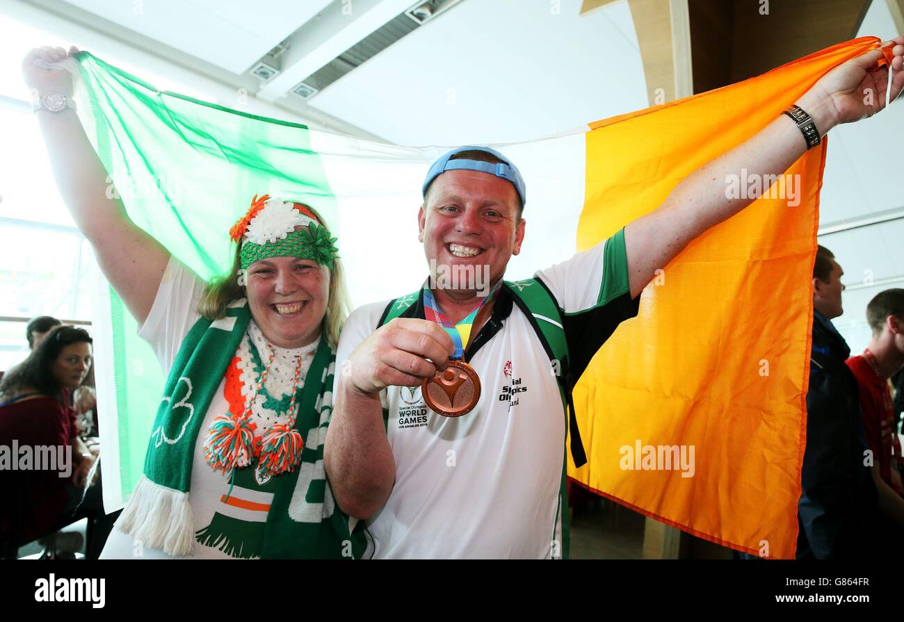Special Olympics Team Ireland athlete David Carrig, with his sister Lisa Kelly, arrives back at Dublin Airport, having represented Ireland in the 2015 Special Olympics in Los Angeles. Stock Photo