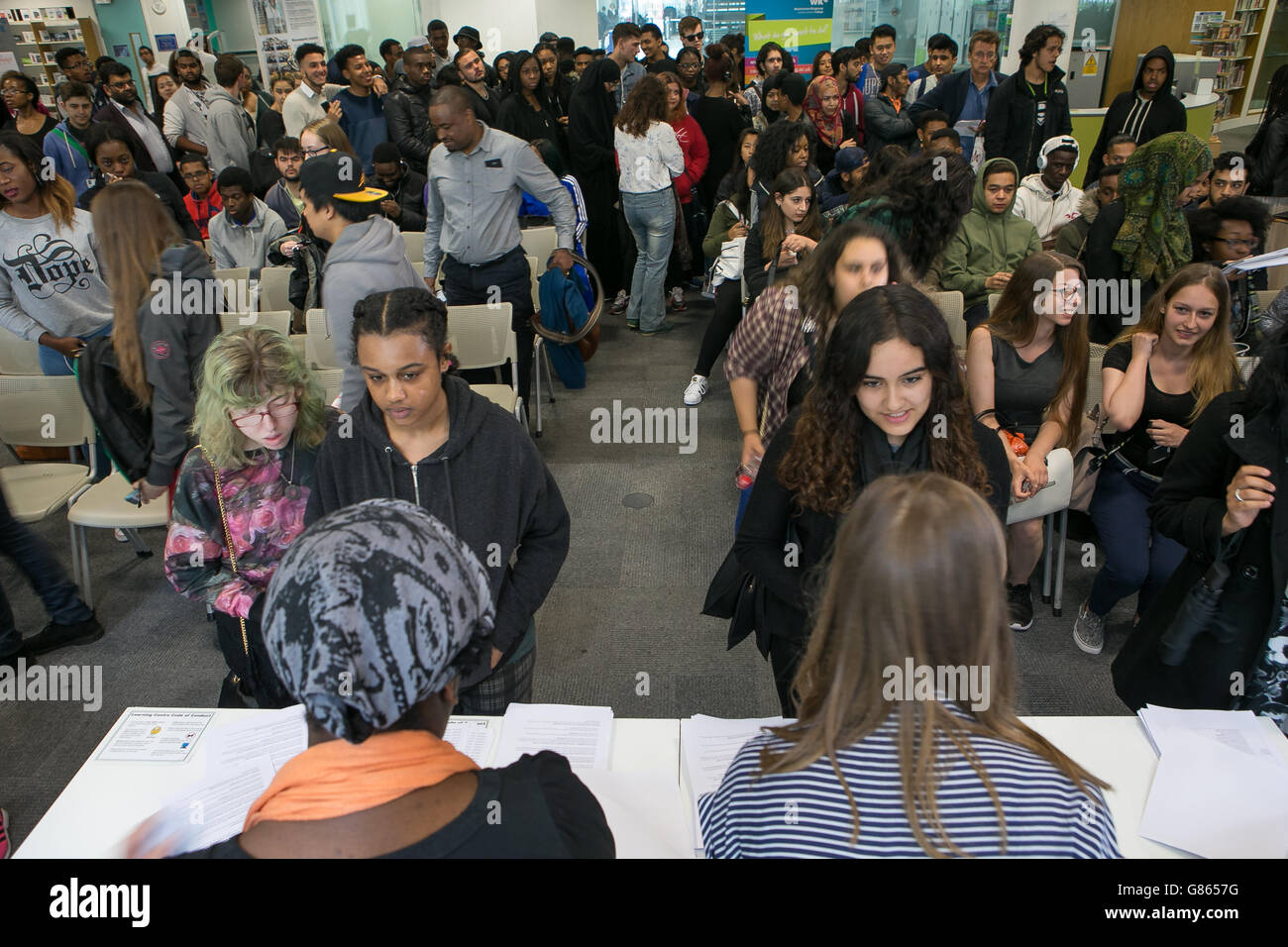 A-level results. Students get their A-level results at Westminster Kingsway College, King's Cross Centre, London. Stock Photo