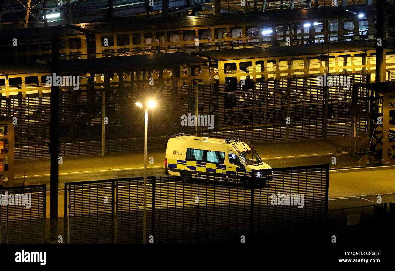 A police van patrols the Eurotunnel site in Folkestone, Kent, as the migrant crisis in Calais continues. Stock Photo