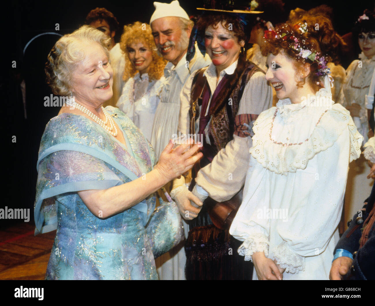 the-queen-mother-meets-the-cast-of-the-pirates-of-penzance-on-her-82nd