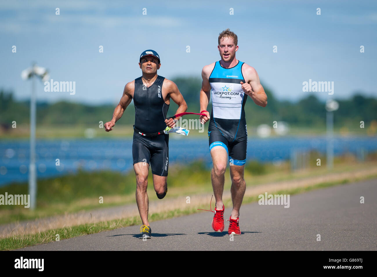 Haseeb Ahmad (left) competes in the Para Tri Elite race during the Para Tri Series at Dorney Lake, Windsor. Stock Photo