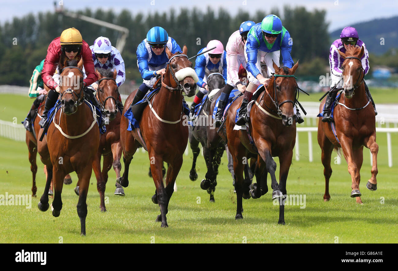 Restive ridden by Colin Keene (left) wins The Anglesey Lodge Equine Hospital European Breeders Fund Maiden during the Keeneland Family Raceday meeting at The Curragh Racecourse, Kildare. Picture date: Sunday August 9, 2015. See PA story RACING Curragh. Photo credit should read Niall Carson/PA Wire. Stock Photo