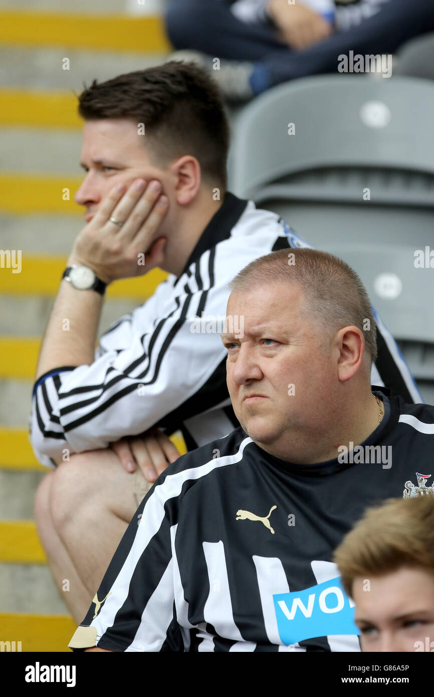Newcastle United fans look dejected during the Barclays Premier League match at St James' Park, Newcastle. Stock Photo