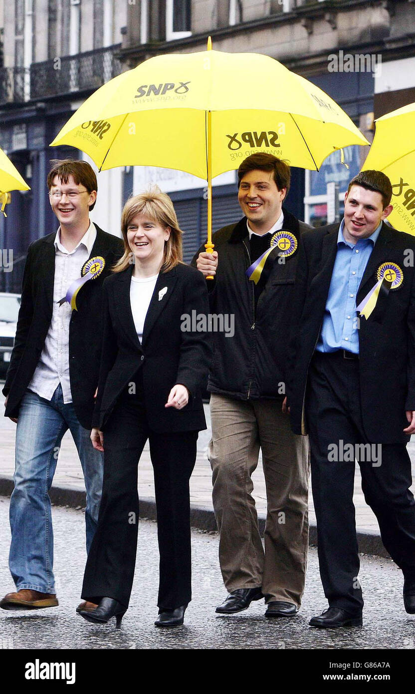 Scottish National Party deputy leader Nicola Sturgeon meets young supporters, (from left to right) Davie Hutchieson, Jamie Hepburn and Graeme Hendry. Stock Photo