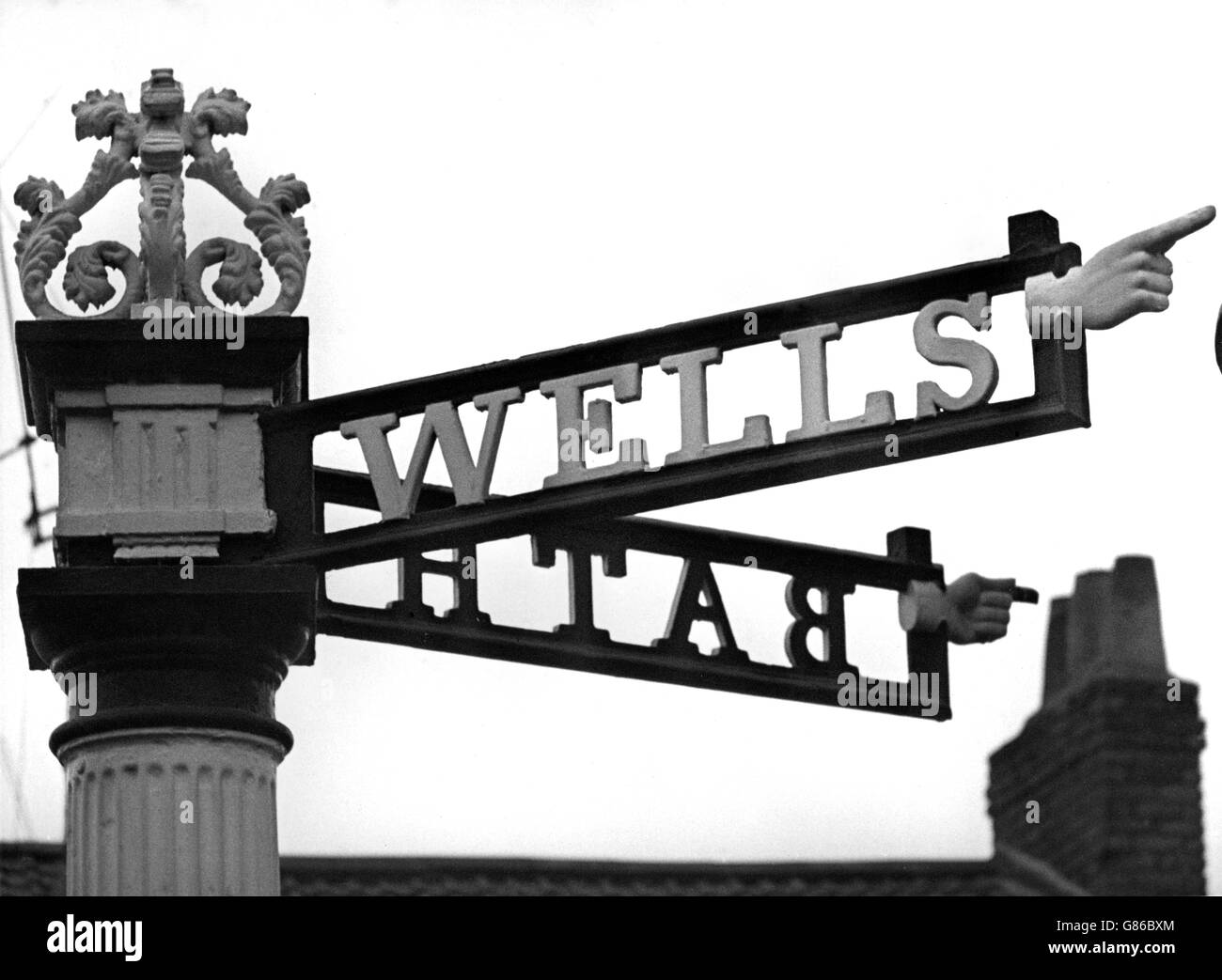 19th-Century Somerset Signpost. A 19th-century iron sign points the way to Bath and Wells. *Neg damaged, scanned from contact. Stock Photo