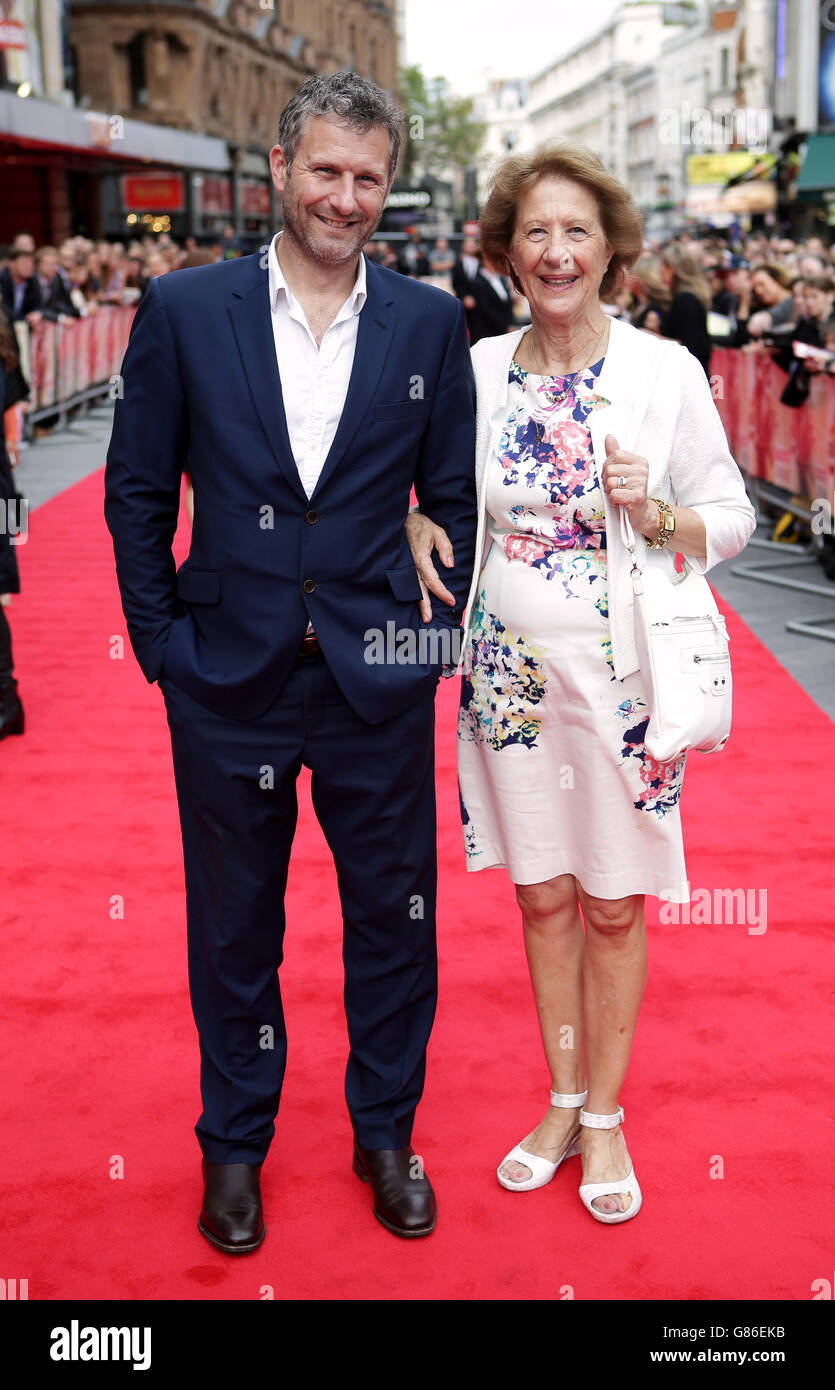 Adam Hills and his mother attending The Bad Education Movie World Premiere, held at Vue West End, Cranbourn Street, London. PRESS ASSOCIATION Photo. Picture date: Thursday August 20, 2015. Photo credit should read: Daniel Leal-Olivas/PA Wire Stock Photo