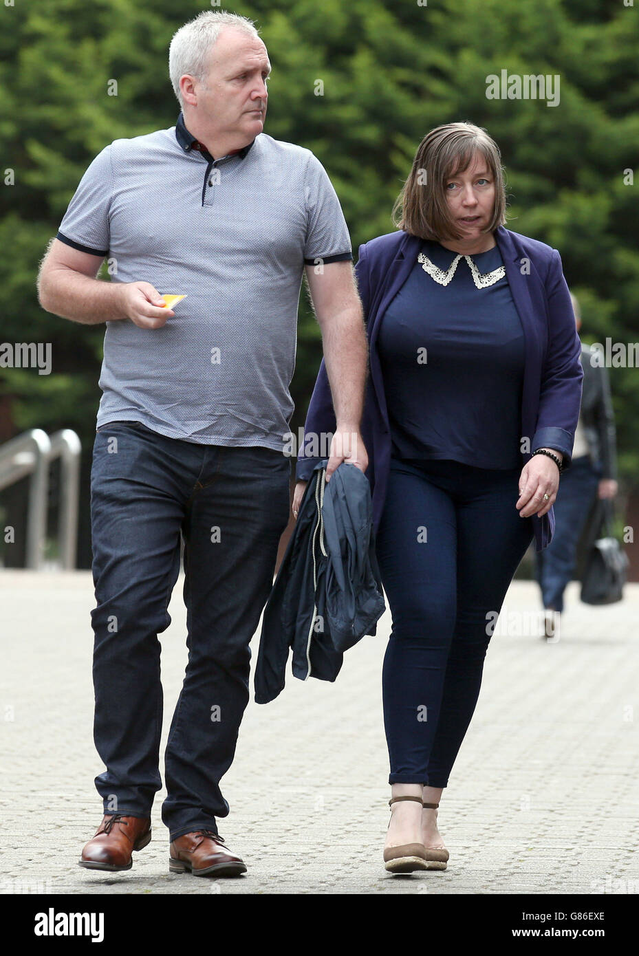 Jacqueline and Matthew McQuade, who lost Jacqueline's parents Jack and Lorraine Sweeney and their daughter Erin in the Glasgow bin lorry crash, arrive at Glasgow Sheriff Court, for the inquiry into the crash which killed six people days before Christmas. Stock Photo