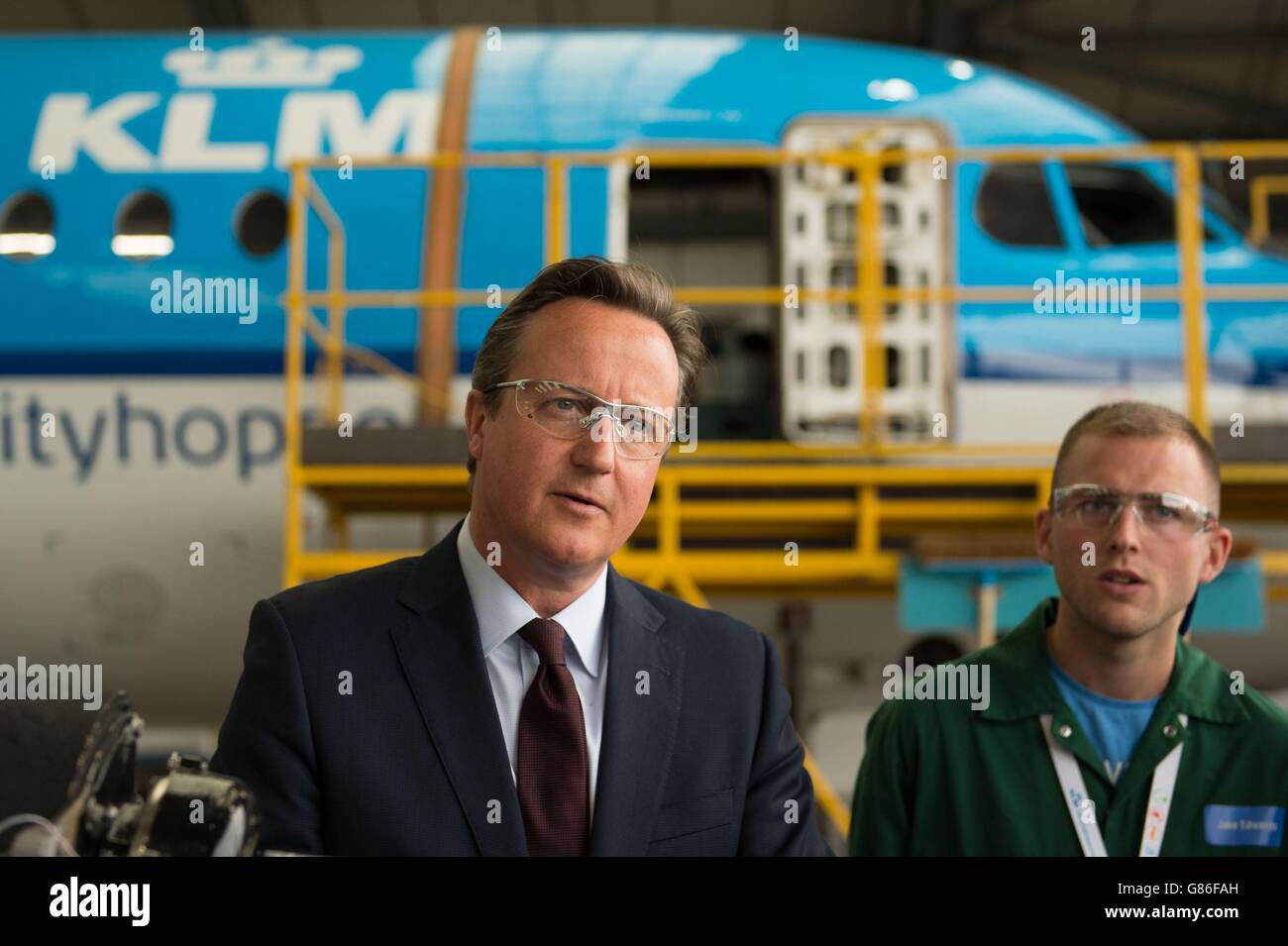 Prime Minister David Cameron meets apprentices employed by KLM Engineering at Norwich Airport in Norfolk, where he restated the importance of apprenticeships to his vision of a 'One Nation' Government. Stock Photo