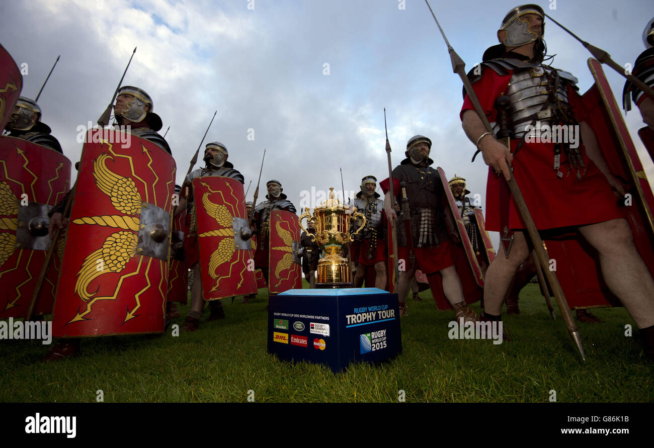 With 50 days to go to the start of the Rugby World Cup 2015, the Webb Ellis Cup was on Hadrian's Wall escorted by the members of the Ermine Street Guard Roman Reenactment Society. Stock Photo