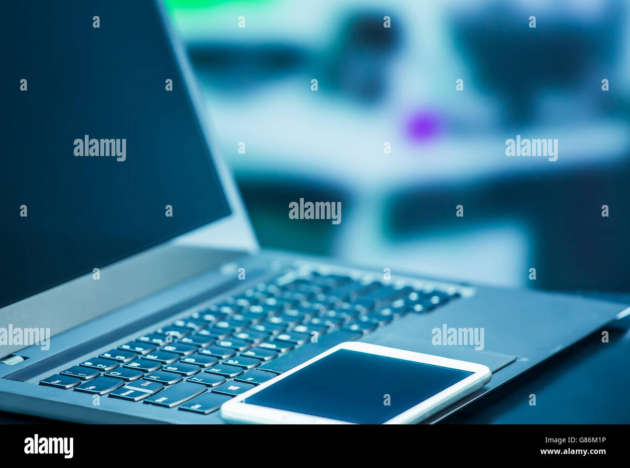 Notebook Close up in blue tone Stock Photo - Alamy