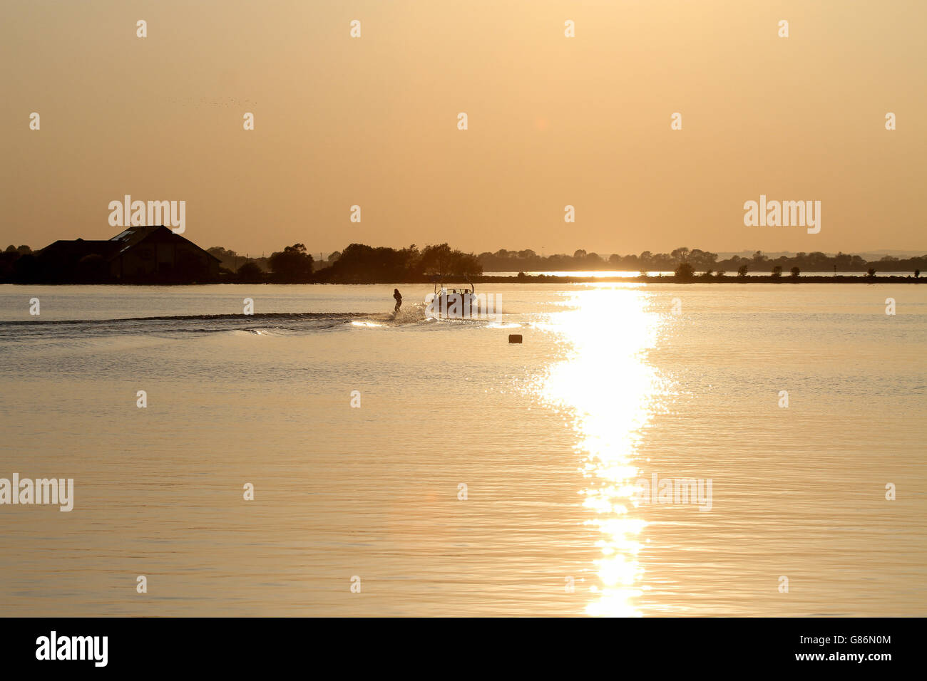 Evening water-skiing on Lough Neagh, Northern Ireland Stock Photo