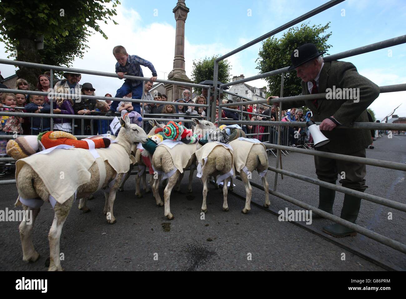 Offical starter Donald Gillespie examines the runners and riders as ...