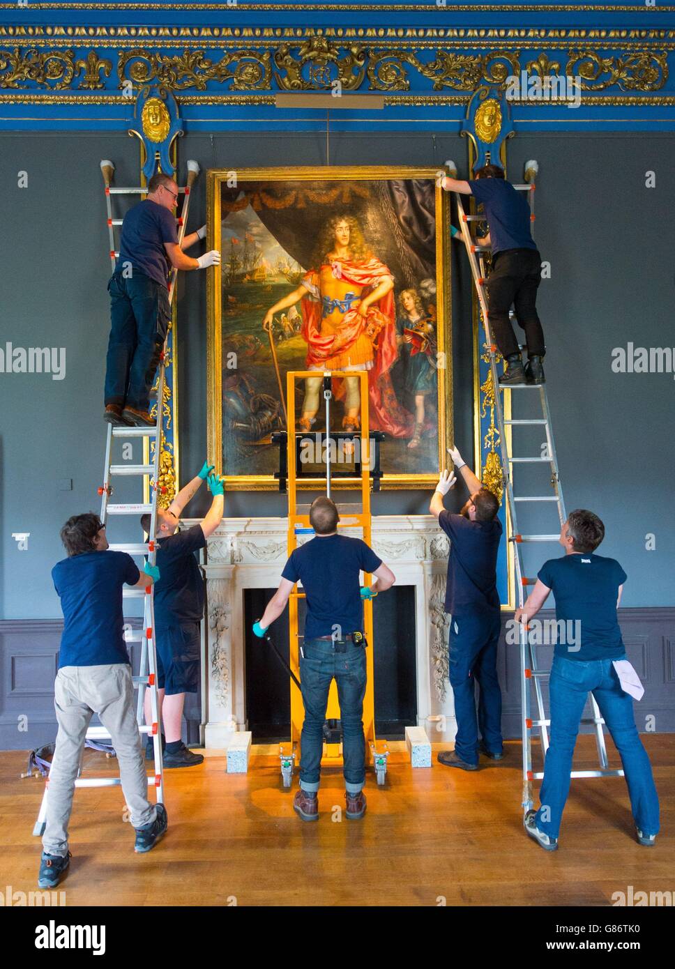 Art and object movers remove the oil painting 'James, Duke of York' by Henri Gascar from the Queen's House, in Greenwich, London, to be part of the forthcoming 'Pepys: Plauge, Fire, Revolution' exhibition at the National Maritime Museum in November. Stock Photo