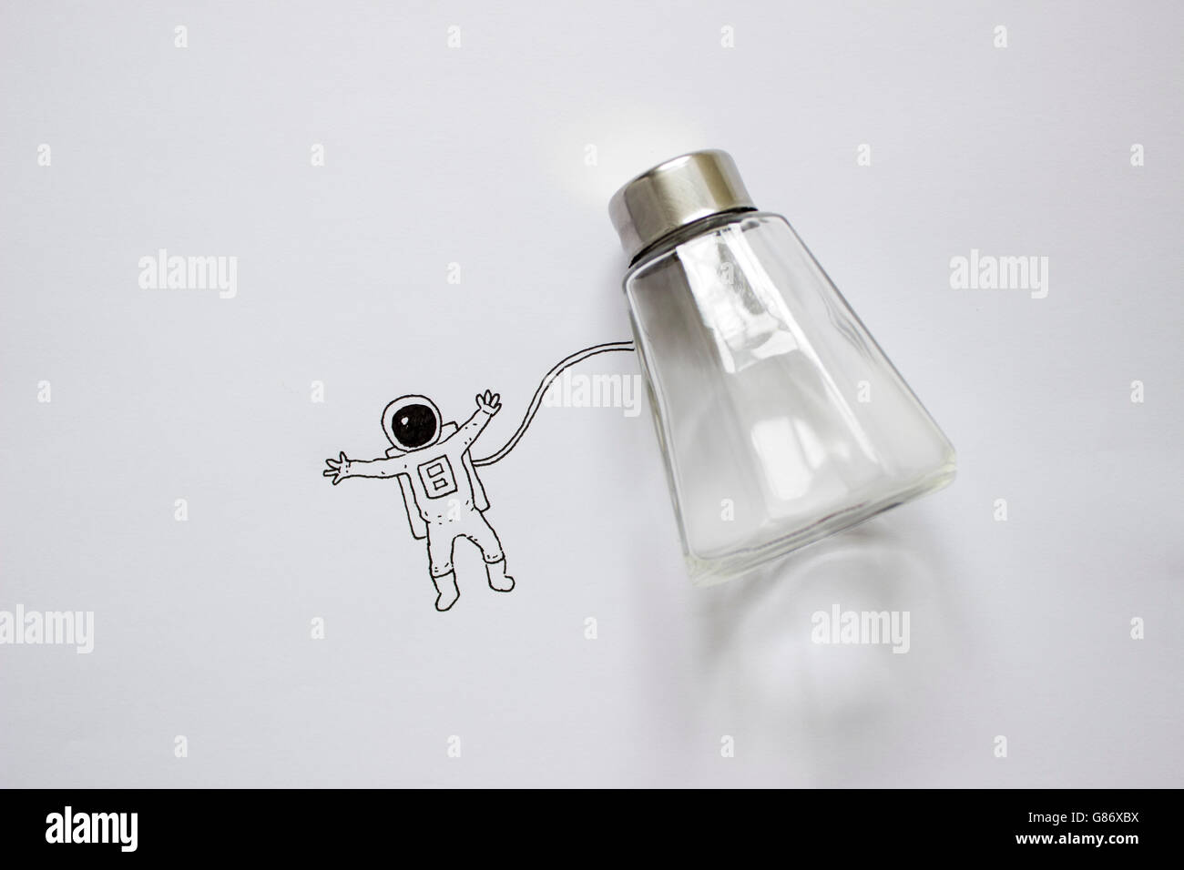 Conceptual astronaut in outer space Stock Photo