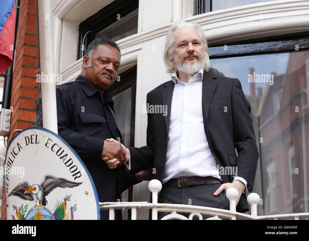 WikiLeaks founder Julian Assange (right) with Reverend Jesse Jackson outside the Embassy of Ecuador in London. Stock Photo