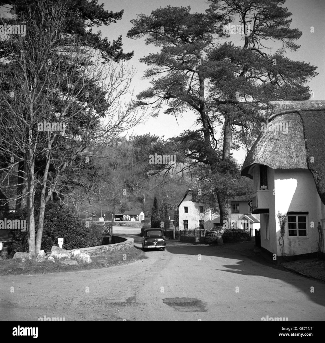 The Somerset village of Winsford on the River Exe. The Royal Oak, its