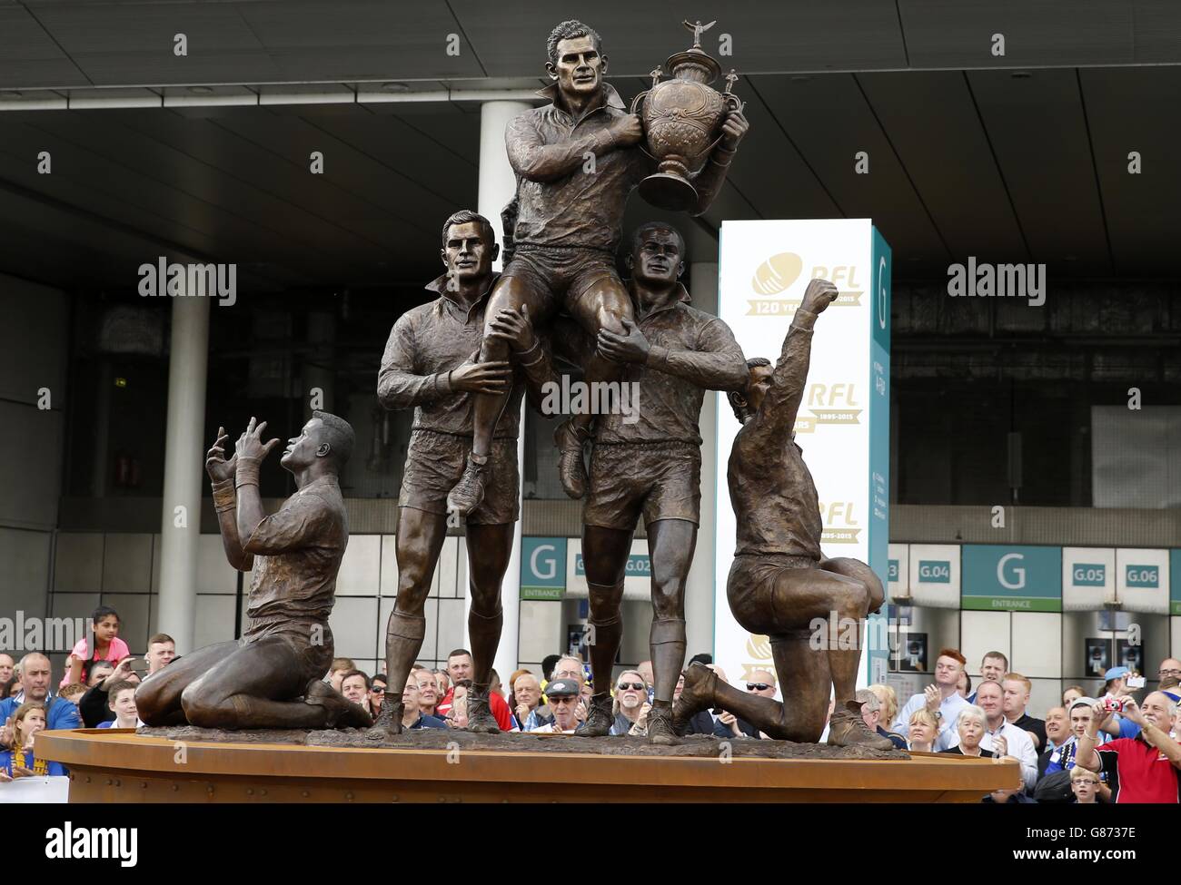 The statue of Rugby League legends Martin Offiah, Alex Murphy, Billy Boston, Eric Ashton and Gus Risman is unveiled at Wembley Stadium before the Ladbrokes Challenge Cup Final at Wembley Stadium, London. PRESS ASSOCIATION Photo. Picture date: Saturday August 29, 2015. See PA story RUGBYL Final. Photo credit should read: Paul Harding/PA Wire. RESTRICTIONS: . No commercial use. No false commercial association. No video emulation. No manipulation of images. Stock Photo