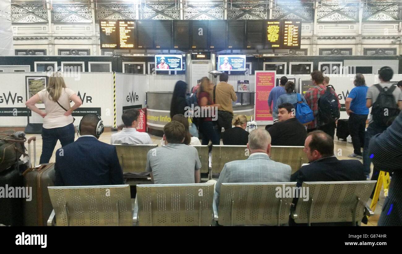 Rail passengers at Paddington station as services were severely disrupted because of power supply problems to the signalling system near Southall, west London, had a severe impact on First Great Western services. Stock Photo