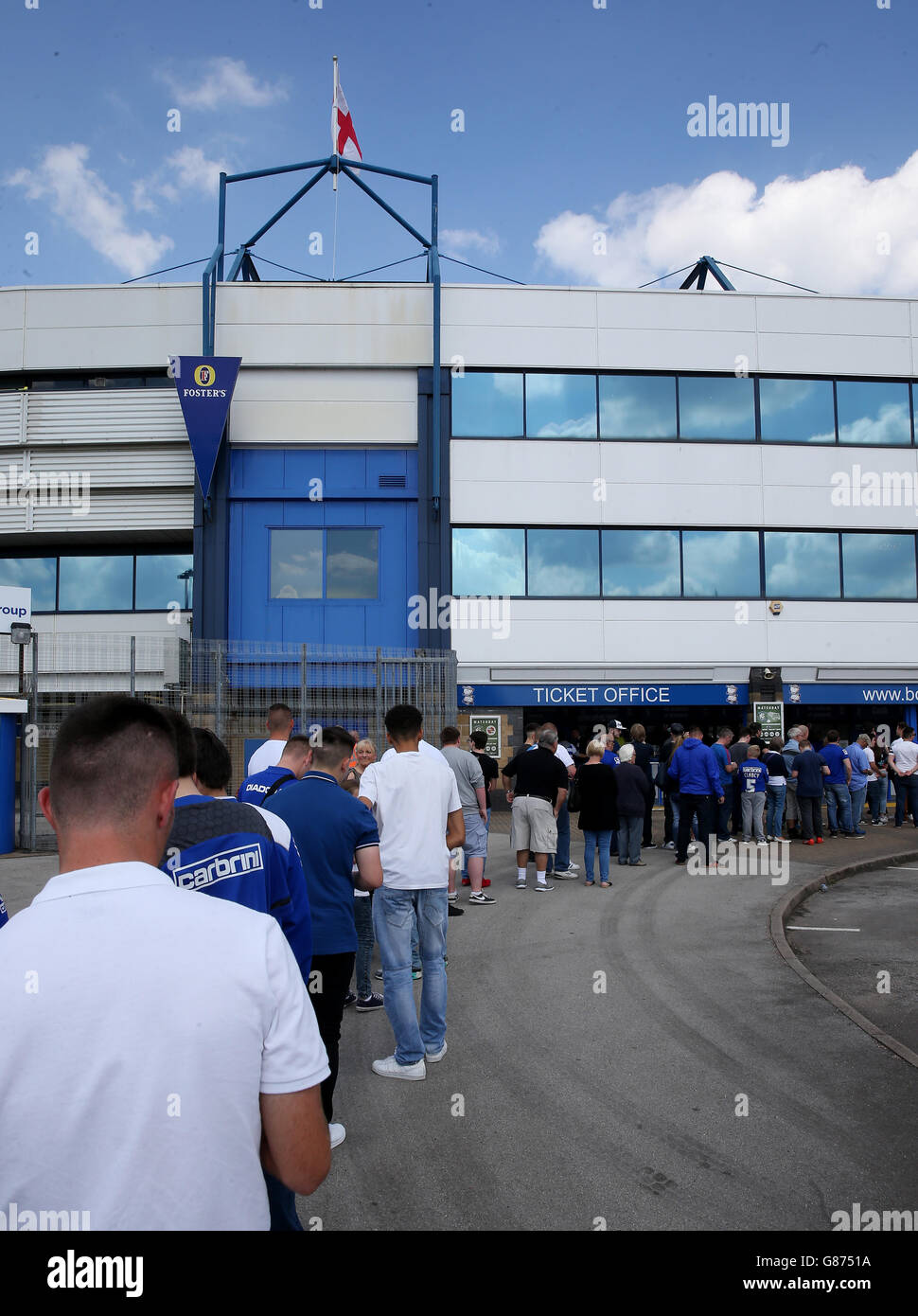 Birmingham city fans queue at the ticket office hires stock
