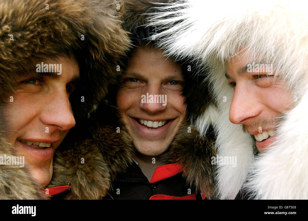 Tom Avery, 29, of Ticehurst, East Sussex, huddles with team-mates Andrew Gerber (left) and George Wells (right) on their return. The British explorers recreated Commander Robert Peary's 1909 expedition, completing the trip in 36 days, 22 hours and 11 minutes. Stock Photo