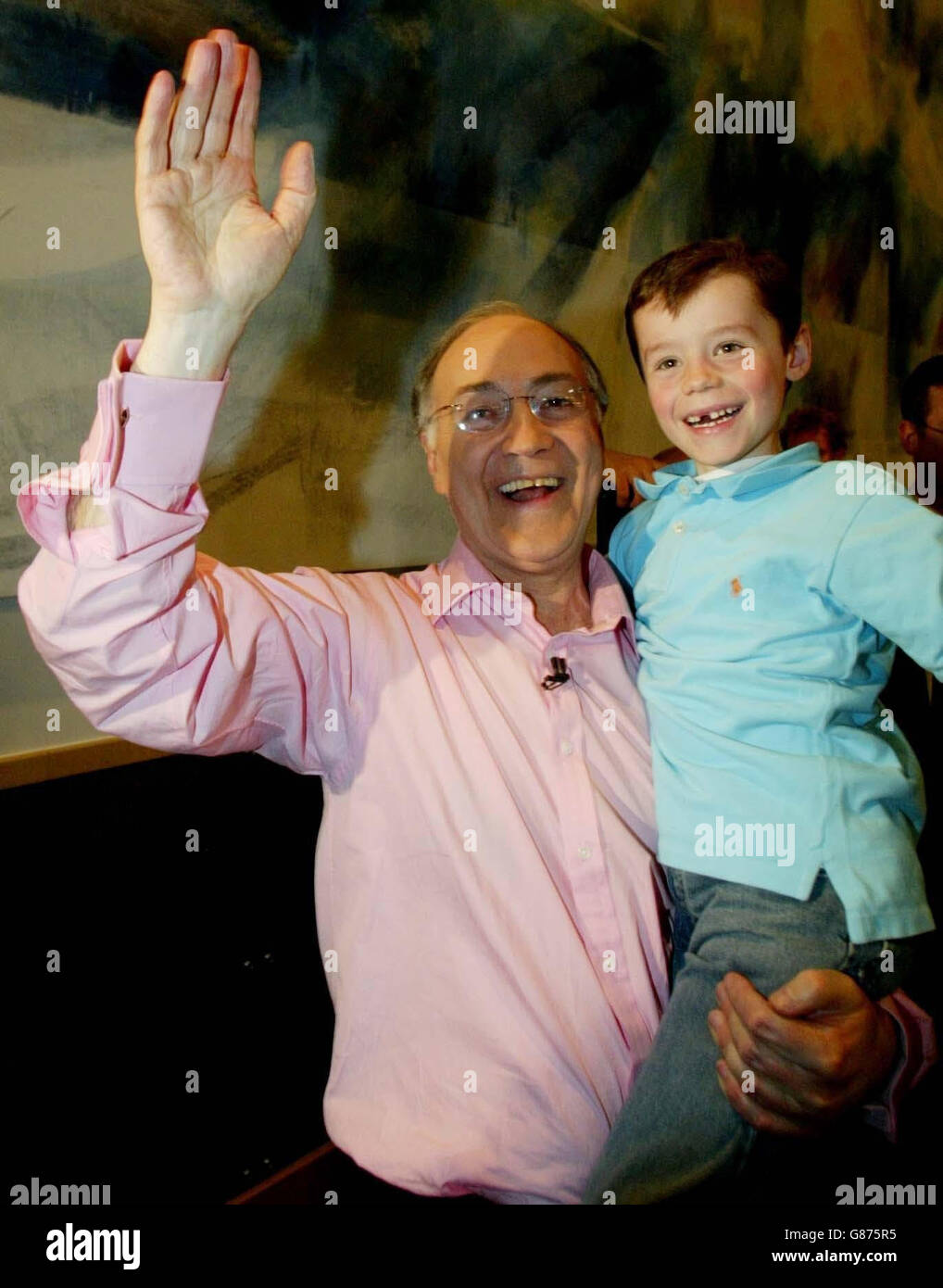 The leader of the Conservative party Michael Howard with his grandson Louis Douglas- Hume, after a party rally. Stock Photo