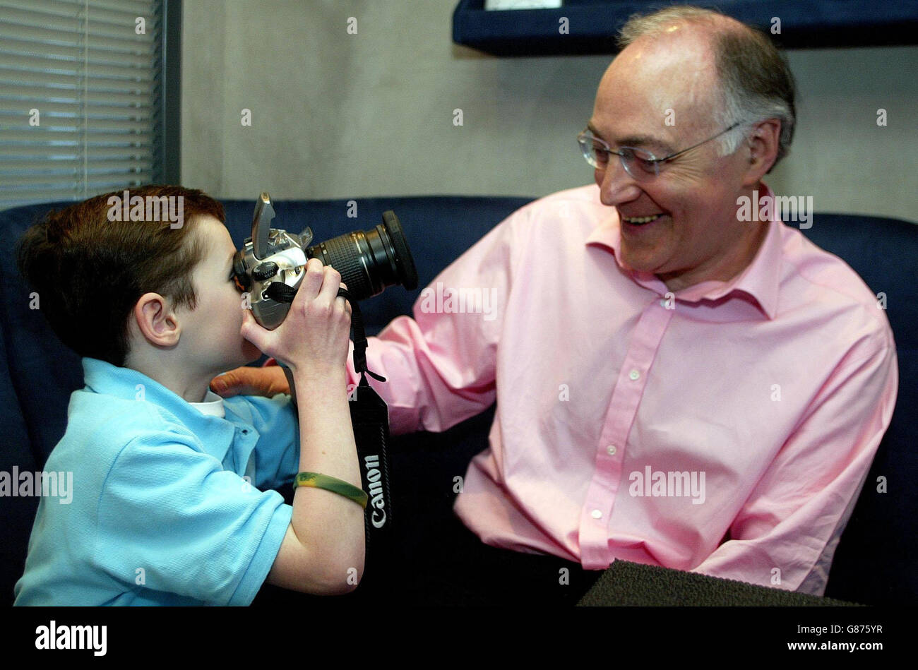 The leader of the Conservative party Michael Howard with his grandson Louis Douglas- Hume. Stock Photo