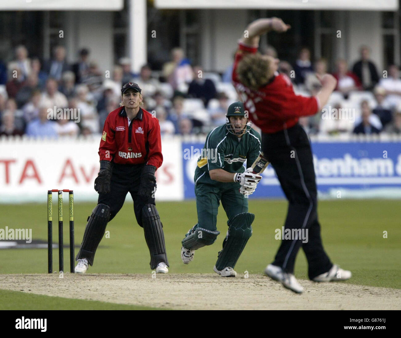 Nottinghamshire's David Hussey scores runs off Glamorgan's bowler Robert Croft watched by wicketkeeper Mark Wallace. Stock Photo